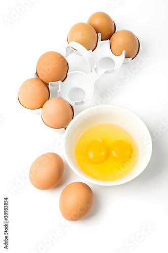 Chicken eggs on the white.