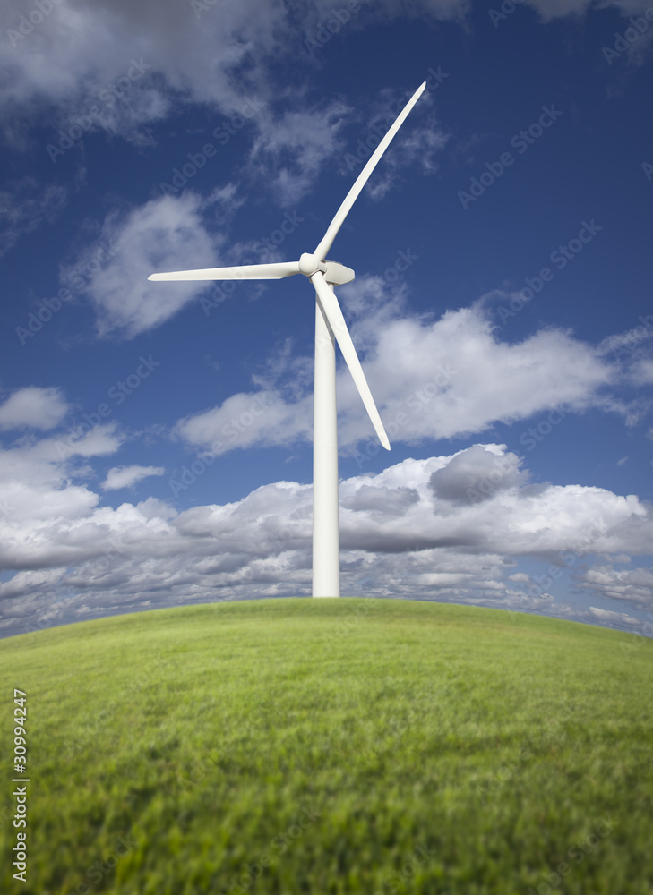 Wind Turbine Over Grass Field, Dramatic Sky and Clouds Wind Turbine Over Grass Field, Dramatic Sky and Clouds