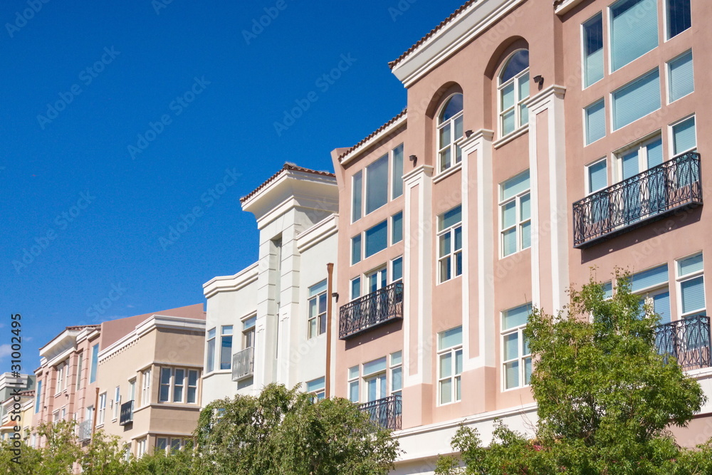 Pink Stucco Buildings with Black Iron Railings Pink Stucco Buildings with Black Iron Railings
