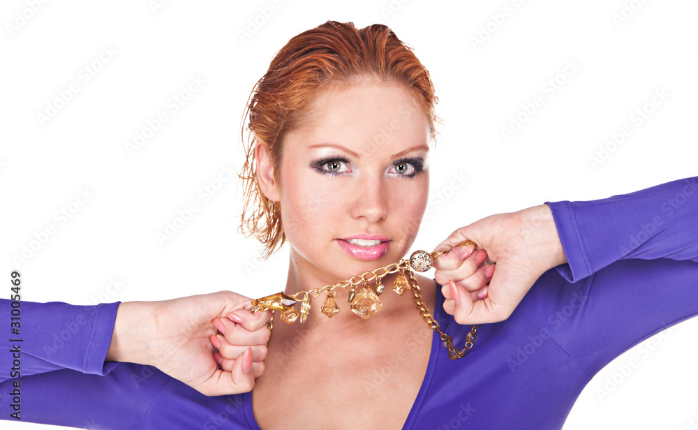 Attractive red-haired woman with jewelry