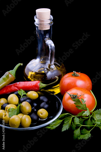 Fototapeta Naklejka Na Ścianę i Meble -  Olive oil, tomatoes, pepper and greens