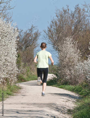 Fotografie jogging nature-femme de dos-