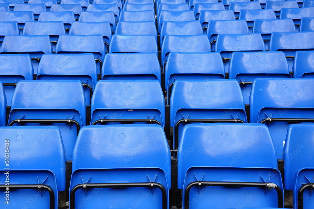 Fototapeta premium Blue seats in row on stadium