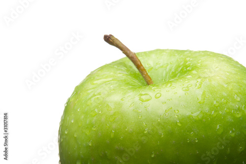 Green apple. Macro. on a white background