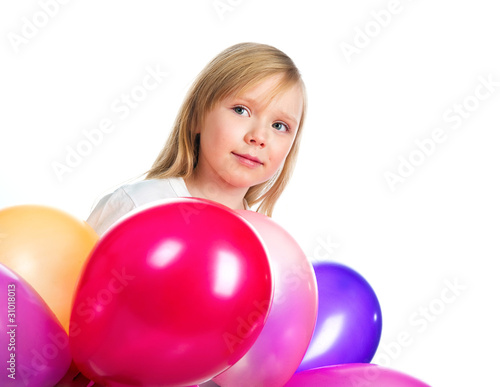 Pretty little girl with balloons