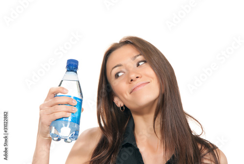 Woman holding a bottle of water in her hand