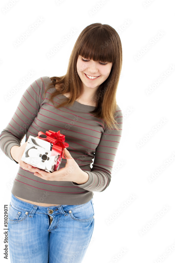 Smiling woman with a gift box. Isolated on white Smiling woman with a gift box. Isolated on white