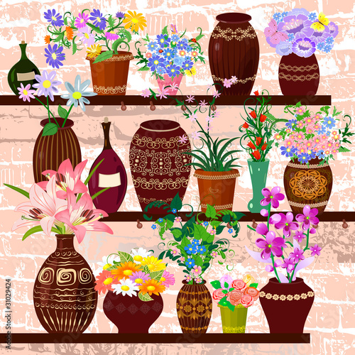 Fototapeta Naklejka Na Ścianę i Meble -  shelves with ceramic pots and flowers