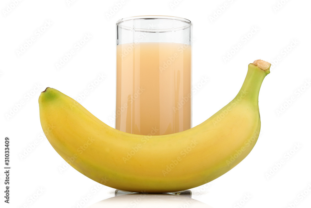 Full glass of banana juice and fruits isolated