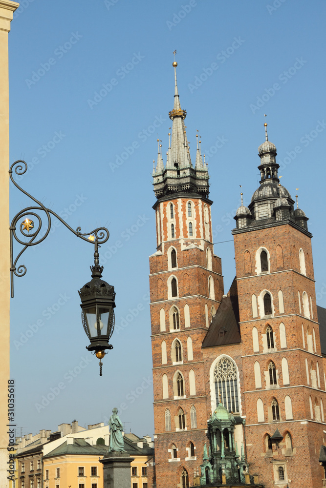 famous landmark of Krakow : St. Mary's Basilica and retro lamp famous landmark of Krakow : St. Mary's Basilica and retro lamp