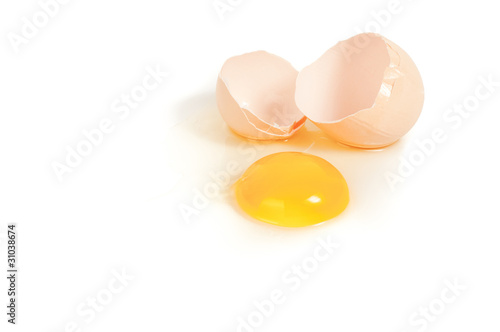 broken egg on white background