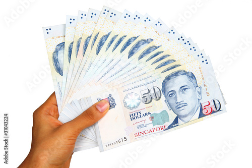 Photography Singapore currency isolated on white background.