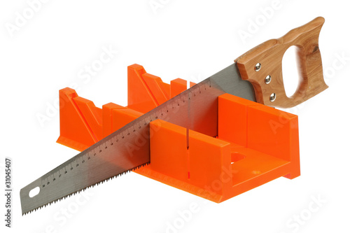 Miter box and miter saw on a white background photo