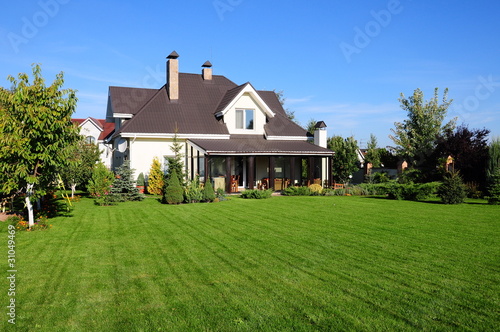 A new house with a garden in a rural area