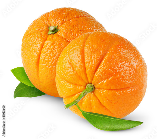 Isolated oranges. Two whole oranges with leaves isolated on white background