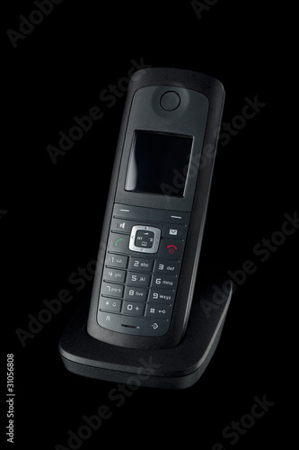 Black wireless telephone on black background with clipping path.