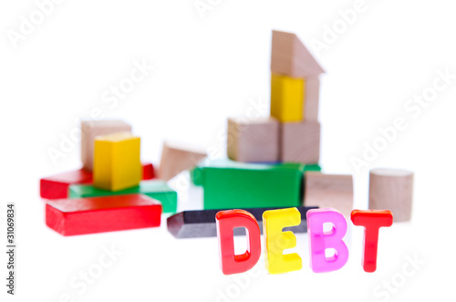 Concept of debt and credit from toy blocks