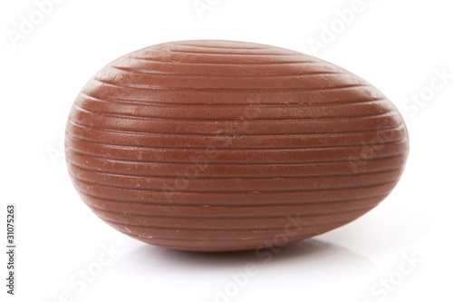 one big brown chocolate easter egg over white background