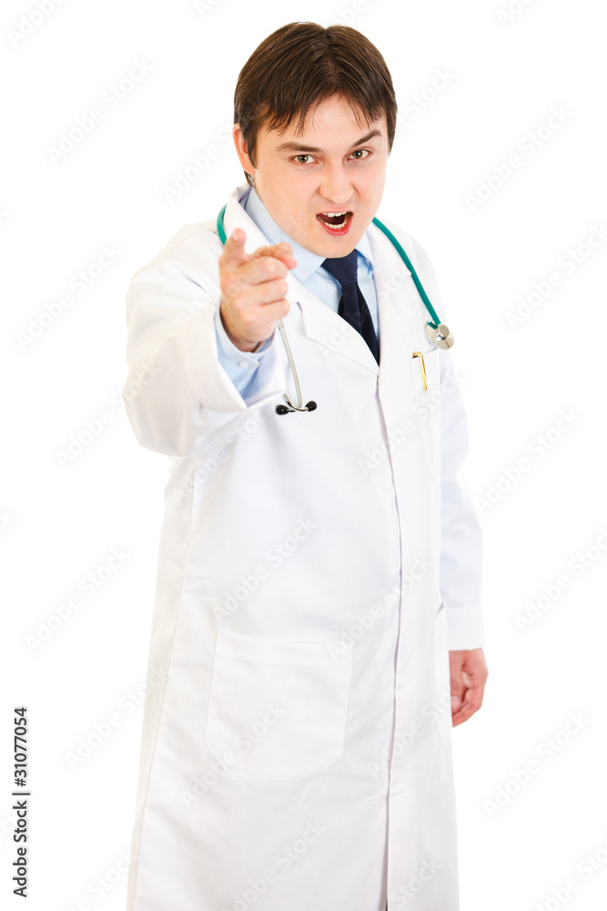 Evil medical doctor shaking his finger isolated on white. Evil medical doctor shaking his finger isolated on white.