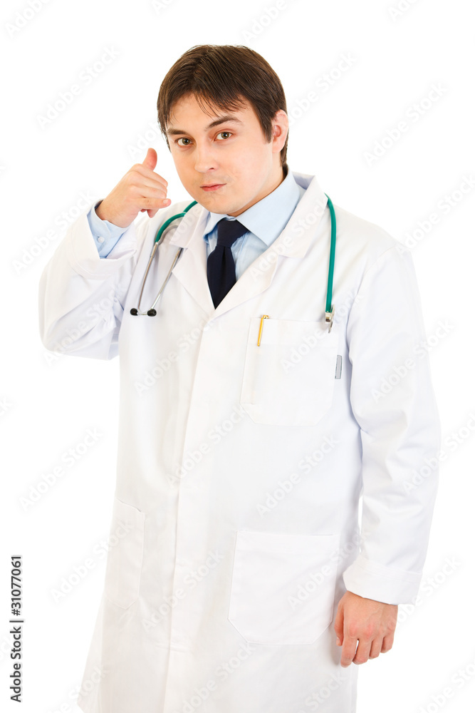 Authoritative medical doctor showing contact me gesture Authoritative medical doctor showing contact me gesture