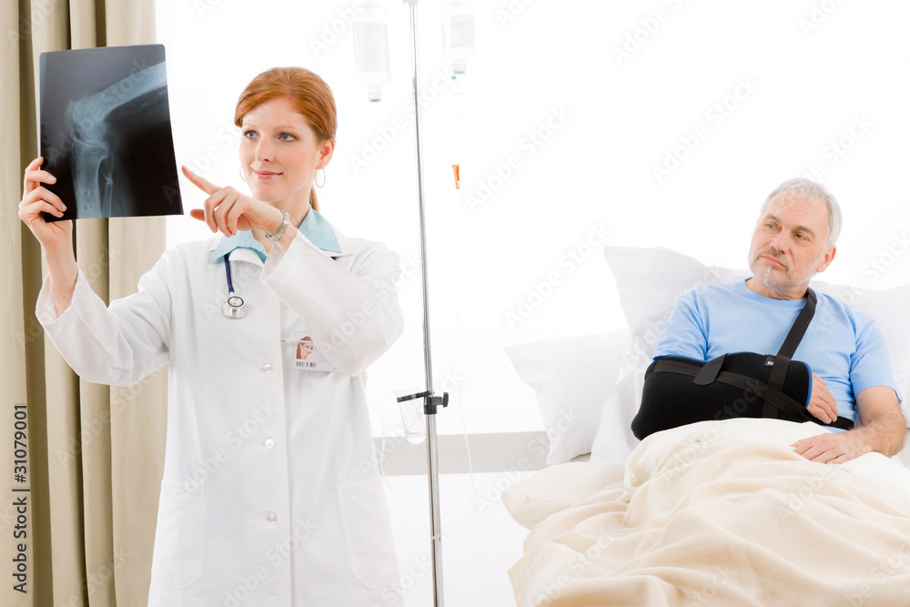 Hospital - female doctor examine x-ray patient Hospital - female doctor examine x-ray patient