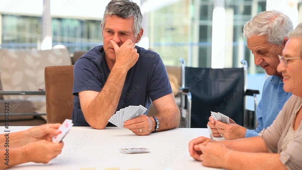 Friends playing cards Friends playing cards