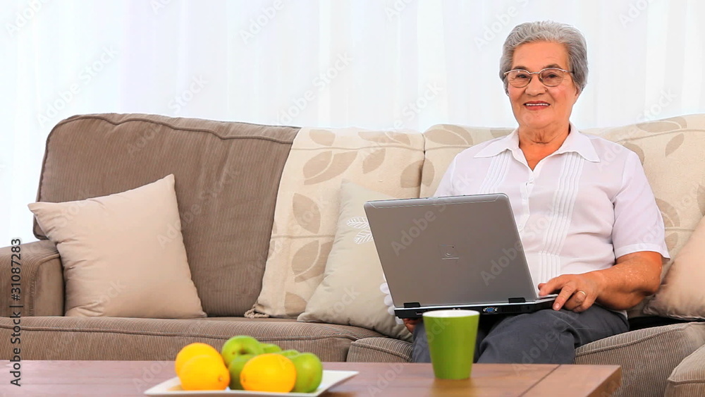 Senior woman working on her laptop Senior woman working on her laptop