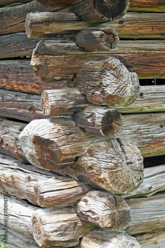 particular corner of a barn in the mountains made of logs