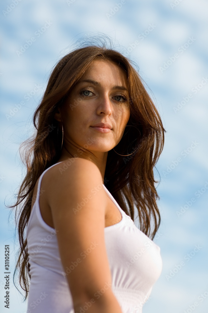 Beautiful girl by the sea.