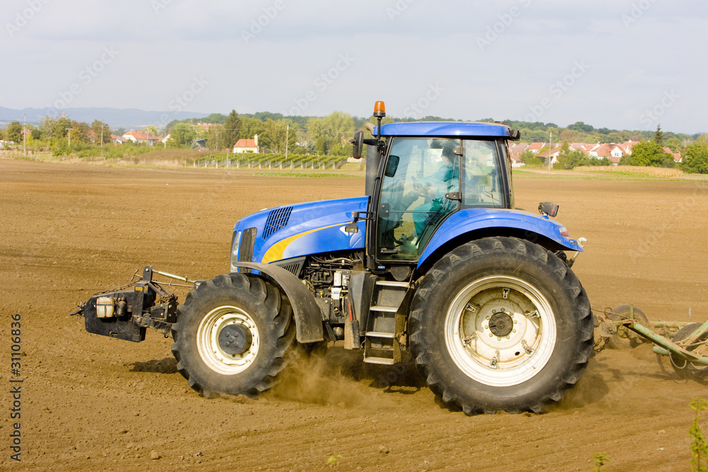 Fototapeta premium tractor on field, Czech Republic