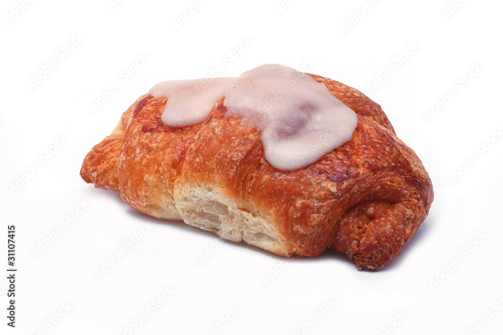 Fresh croissant with powdered sugar