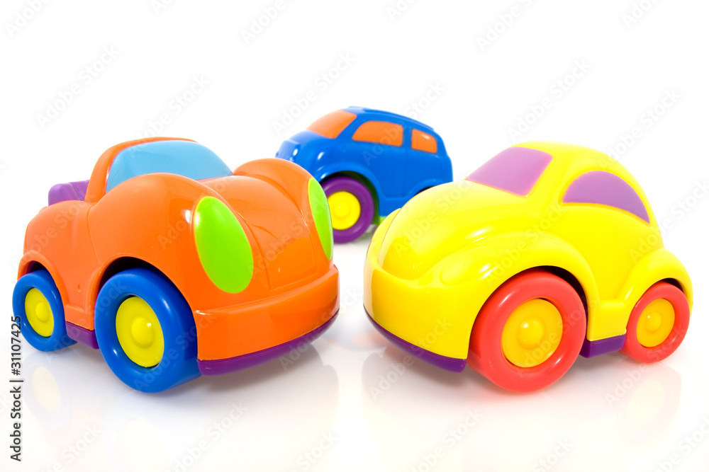 vivid multicolored cars with reflection on white background vivid multicolored cars with reflection on white background