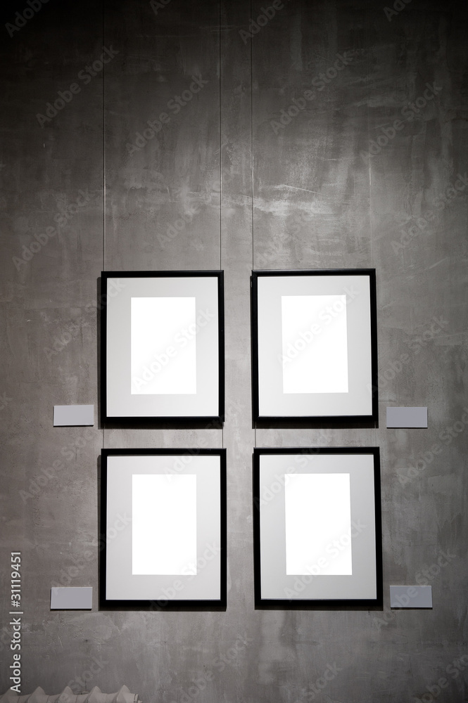 Empty frames on the plaster wall Empty frames on the plaster wall