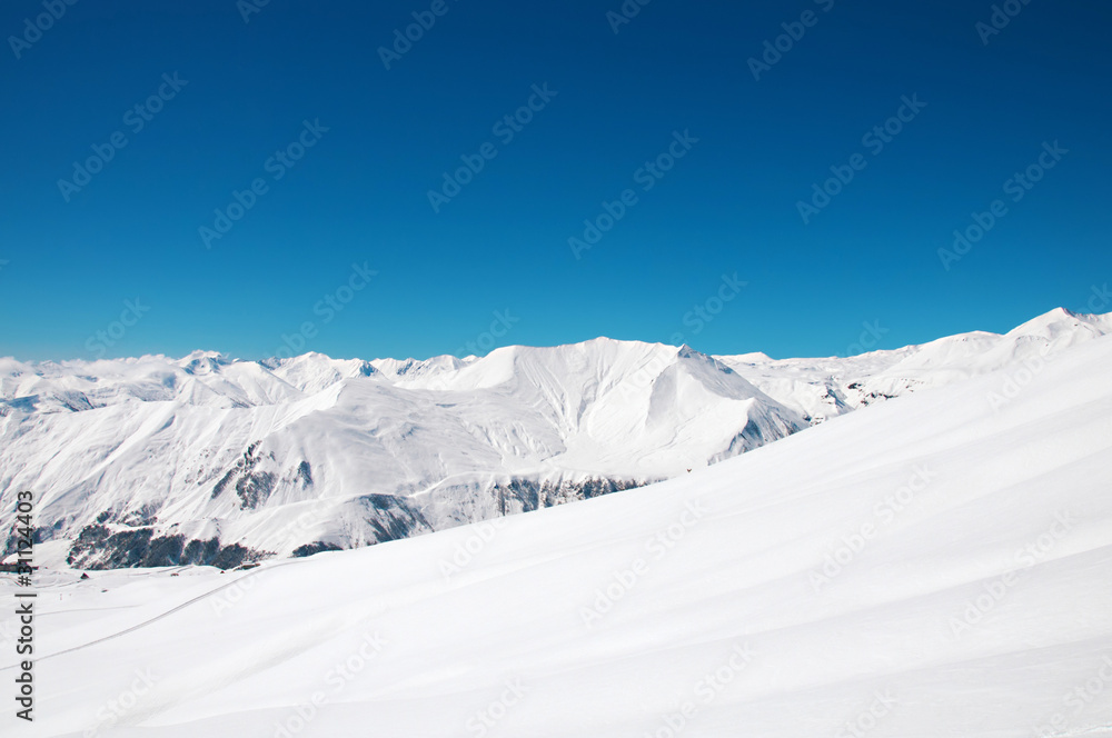 High mountains under snow in the winter High mountains under snow in the winter