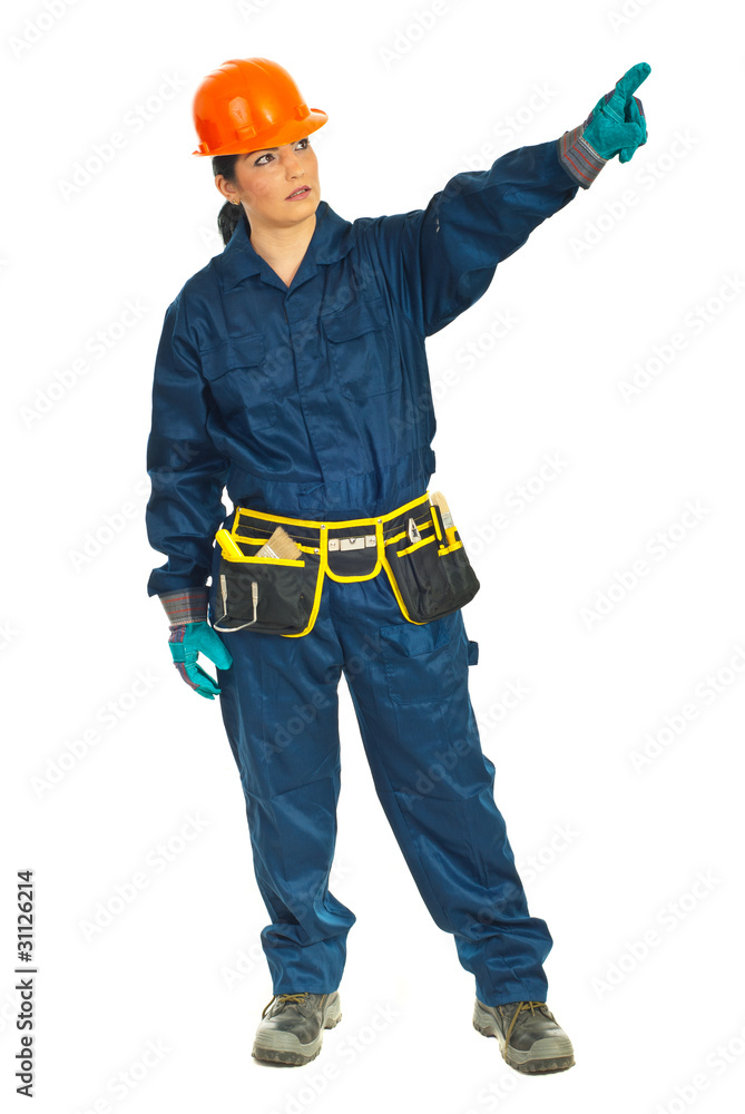 Full length of worker woman pointing