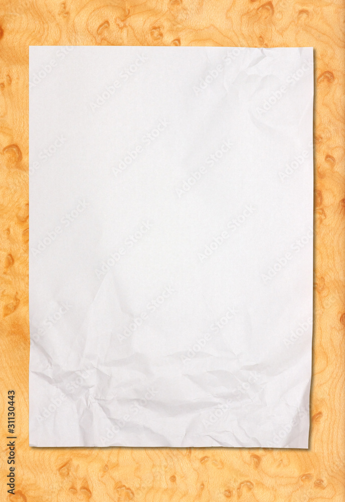 crumpled white paper on wood background crumpled white paper on wood background