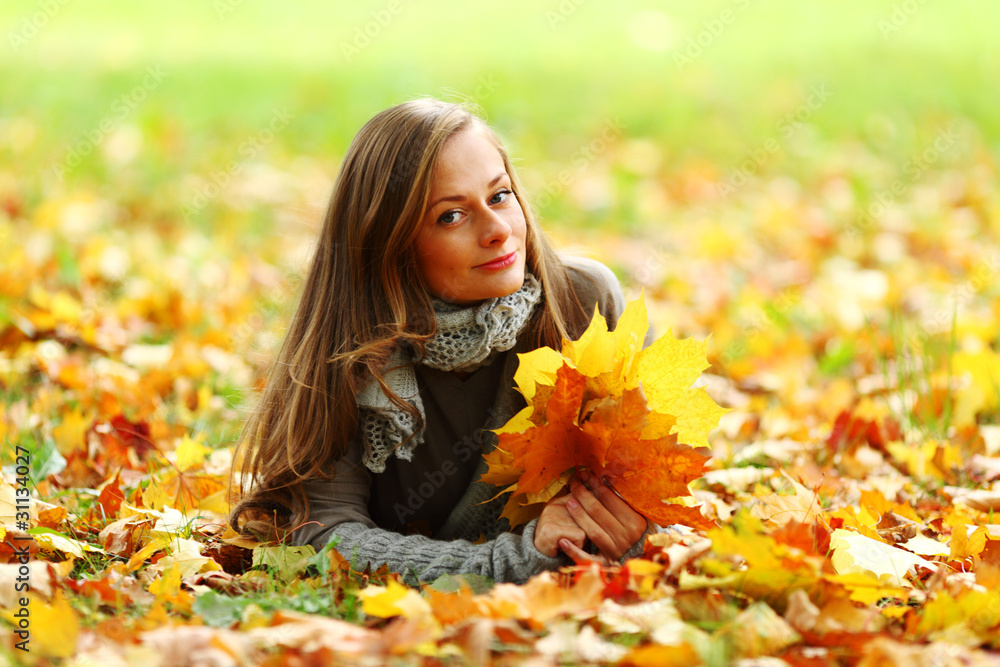 woman portret in autumn leaf woman portret in autumn leaf