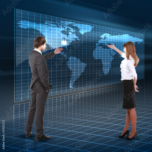 young man touches a virtual surface.