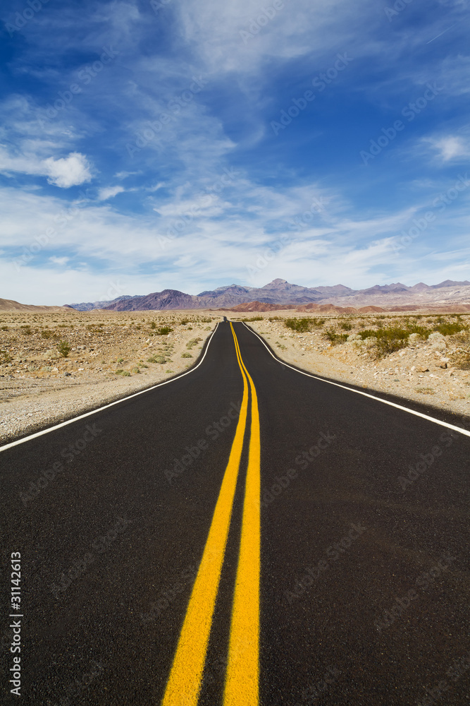 Travelling down the road in desert