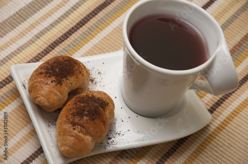 Fototapeta Naklejka Na Ścianę i Meble -  Tea and mini croissants