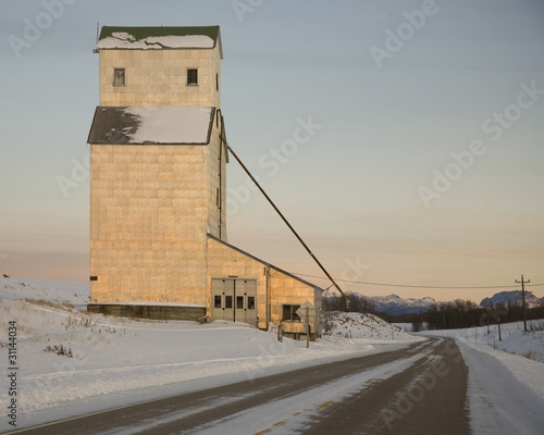 Silo building on a country road. photo