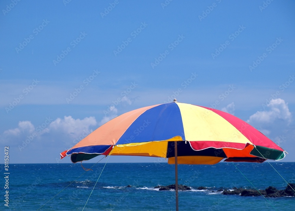 Colorful Beach Umbrella by the Sea