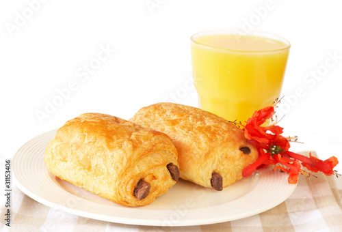 Chocolate croissants and orange juice