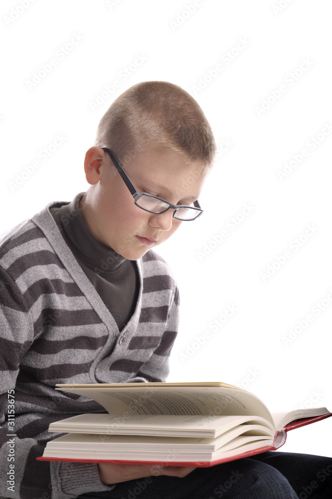 boy reading a book on white background boy reading a book on white background