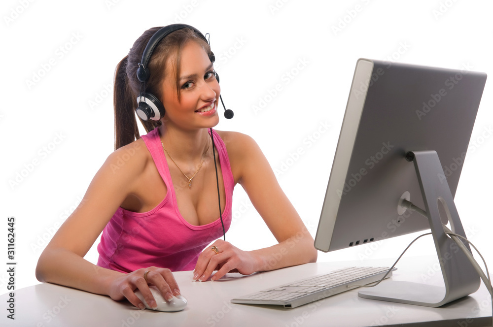 pretty girl works on a computer pretty girl works on a computer