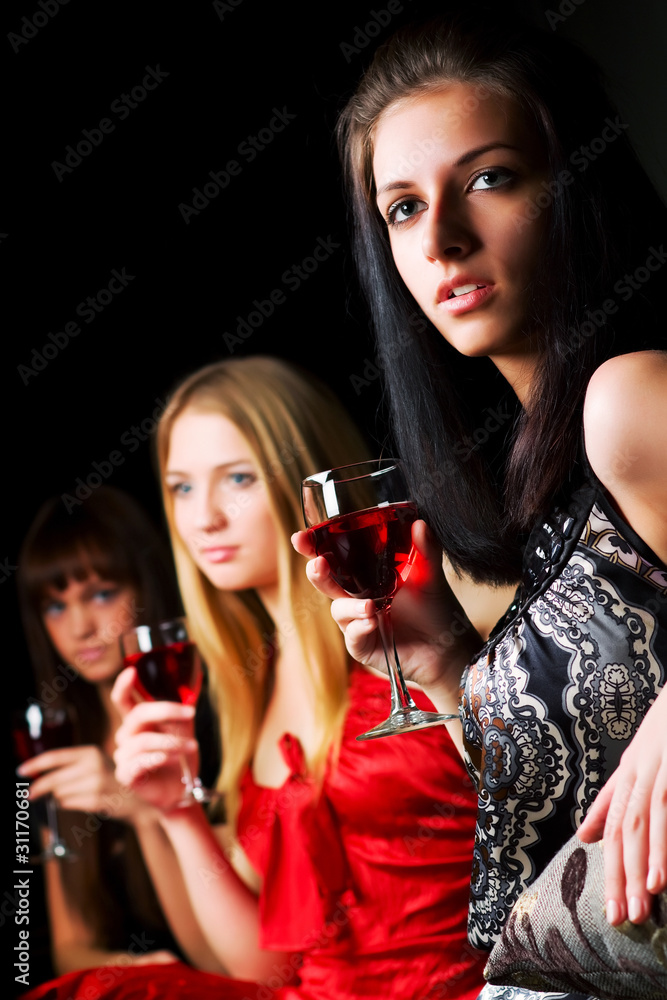 Young women relaxing in a bar