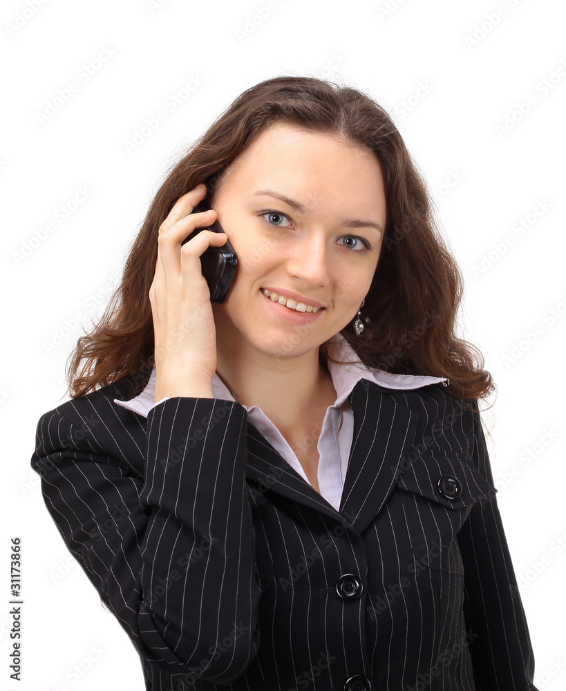The beautiful business woman on the phone on a The beautiful business woman on the phone on a