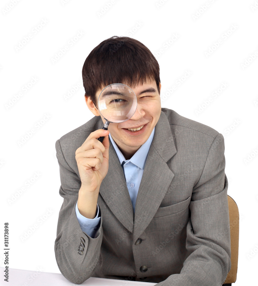 The young business man on a white background The young business man on a white background