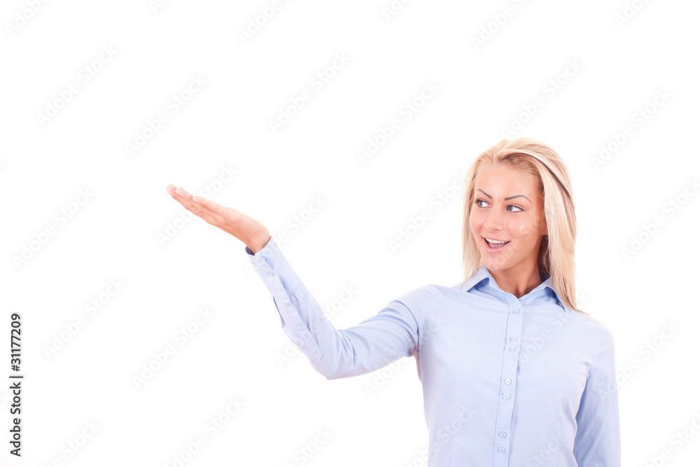 Attractive teenage girl smiling and showing isolated Attractive teenage girl smiling and showing isolated