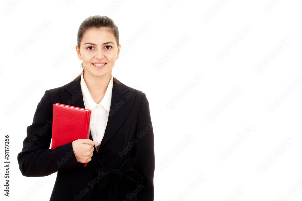 Attractive bussiness woman holding a red book isolated Attractive bussiness woman holding a red book isolated
